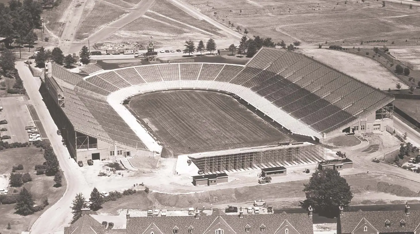 Aerial view of football field with an empty stadium